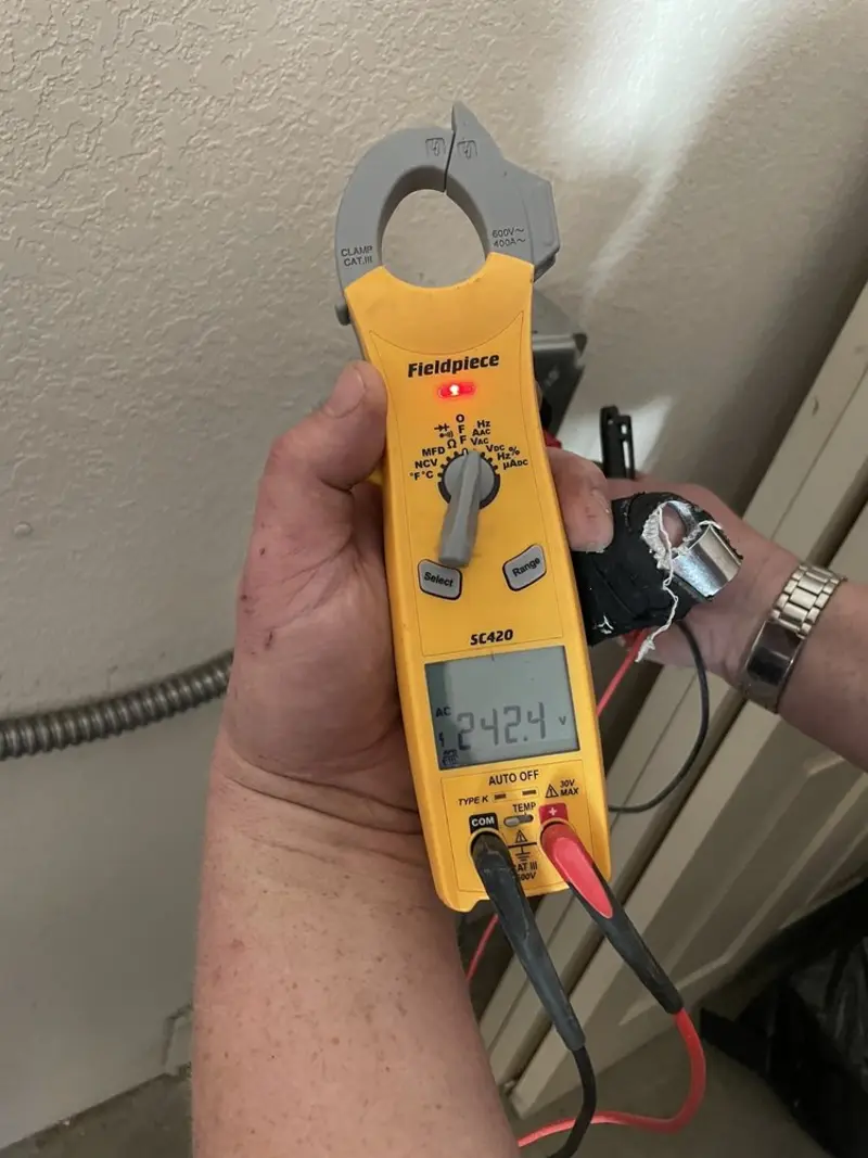 Voltage testing with clamp meter during Generator Installation in Jonesborough